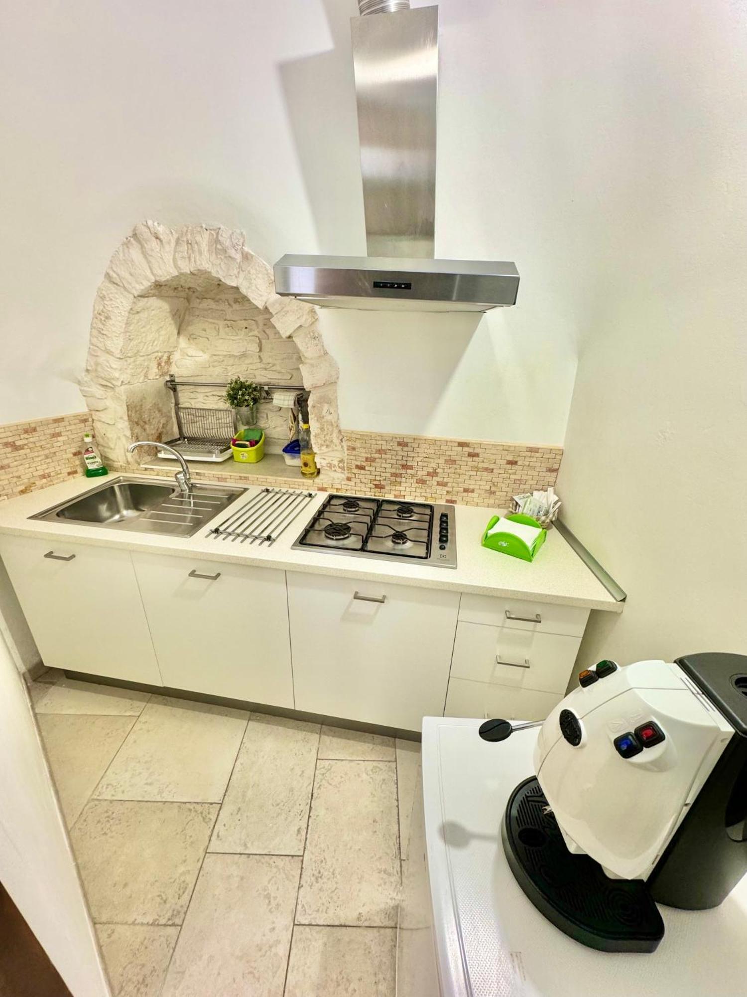 Trulli Fenice Alberobello Bilik gambar
